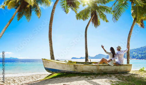 Happy Couple Relaxing on the Ocean. Seychelles island