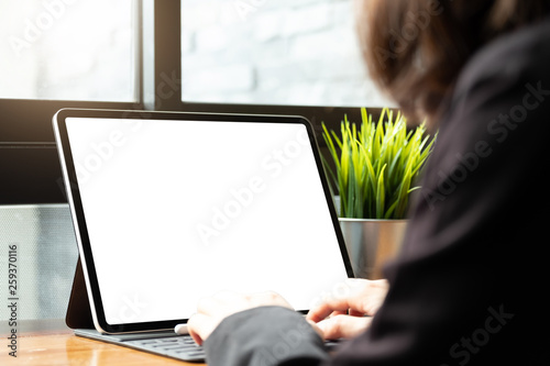 Businesswoman working with digital tablet computer for financial analysis - Business Working at modern office Concept