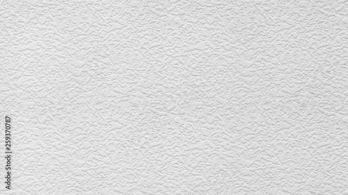 White concrete stucco wall with abstract snow shape paint surface, seamless, for background or texture.
