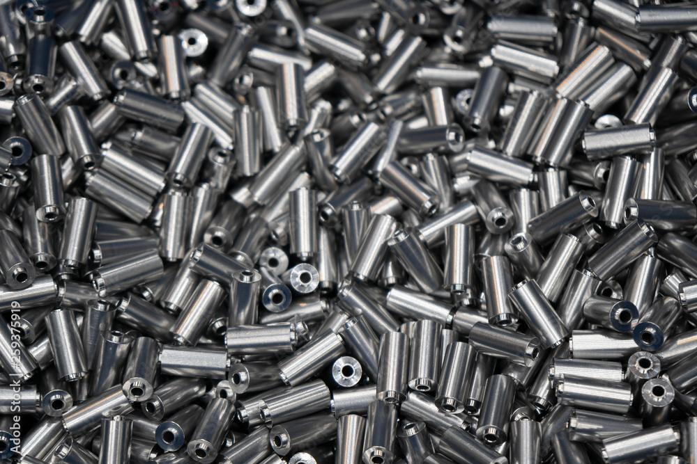 The heap of machined material rod in the container box .Material for manufacturing process. The heap of machined material rod in the container box .Material for manufacturing process.
