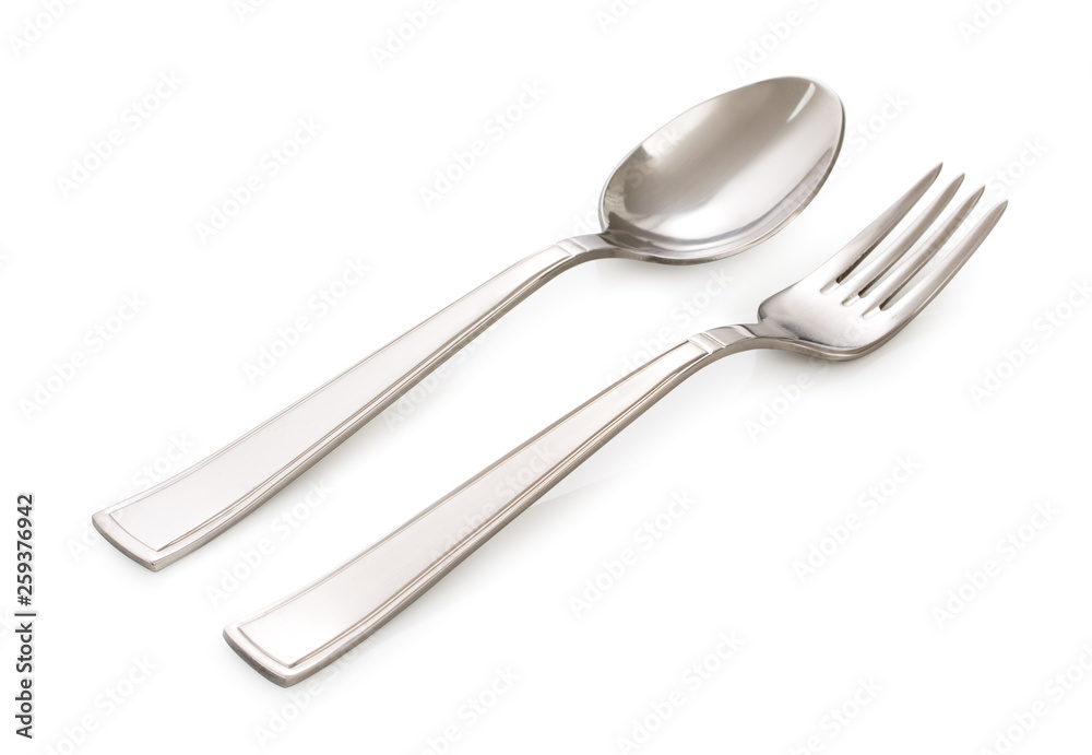 Stainless steel silver fork and spoon isolated on a white background. Stainless steel silver fork and spoon isolated on a white background.