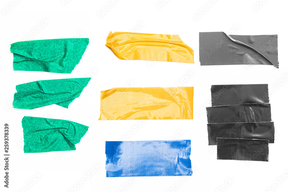 Set of yellow, black, green, blue  tapes on white background. Torn horizontal and different size black sticky tape, adhesive pieces.