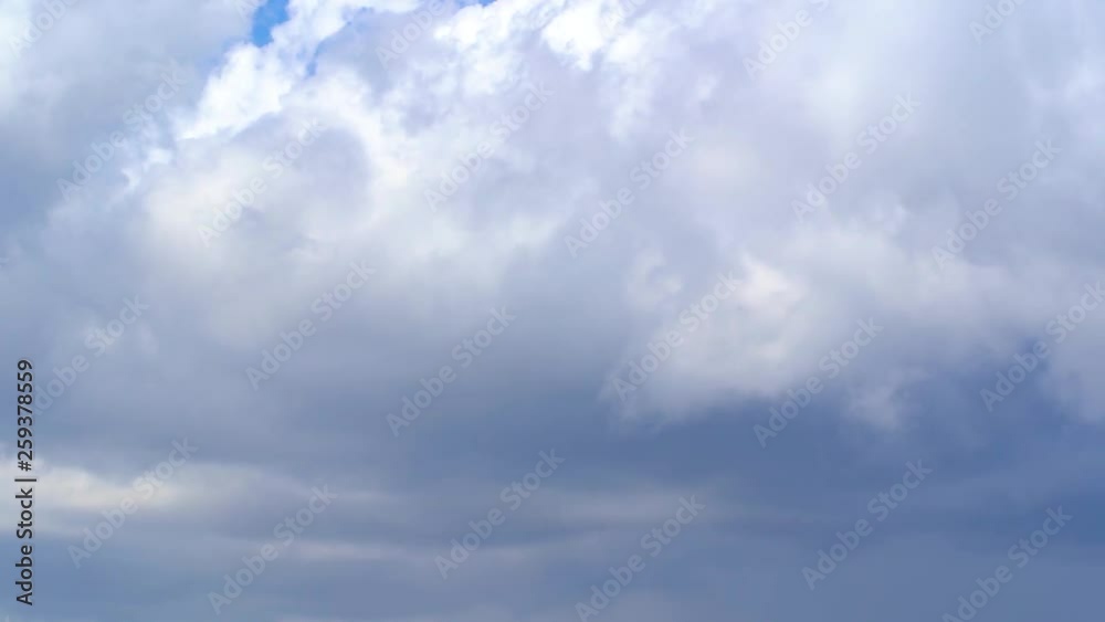 Beautiful timelapse. White clouds running in blue sky background. Slow motion full hd video footage. Beautiful timelapse. White clouds running in blue sky background. Slow motion full hd video footage.