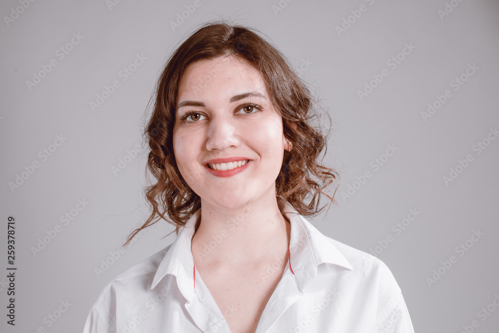 portrait of a girl in the studio on a light background portrait of a girl in the studio on a light background