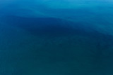 Aerial top view of Blue ocean surface background