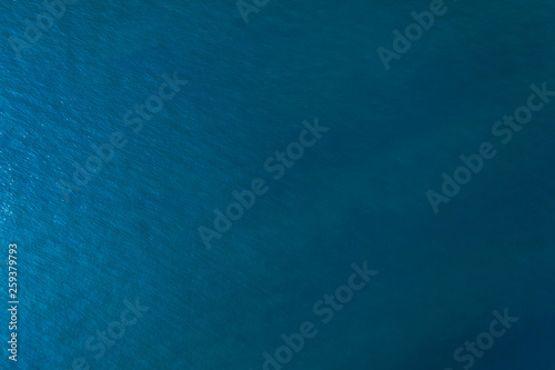 Aerial top view of Blue ocean surface background