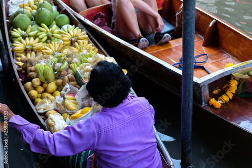 Fruit and local food sell on boat at floating  market photo