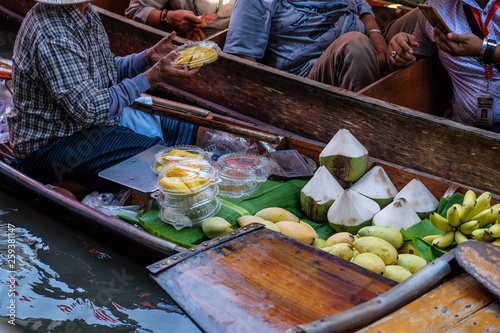 Fruit and local food sell on boat at floating  market photo