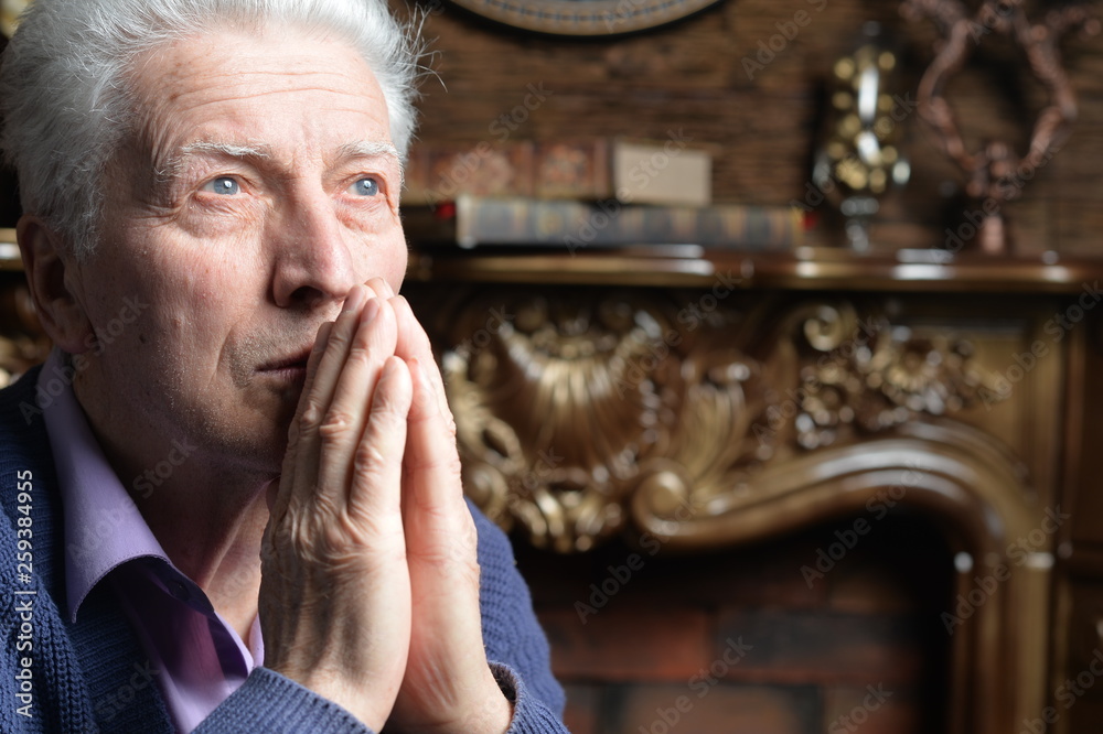 Portrait of Sad senior man praying Portrait of Sad senior man praying