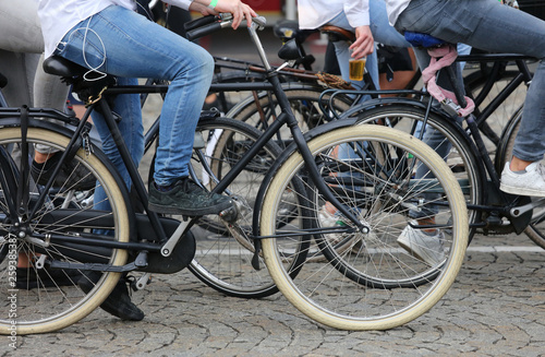 boy with jeans pedal on a the bicycle
