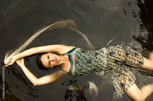 Modern Ophelia in lily pads photo