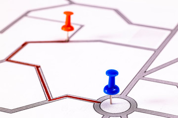 Street map with thumbtacks marking a route