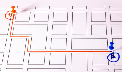 Street map with thumbtacks marking a route