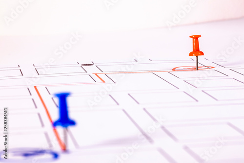 Street map with thumbtacks marking a route