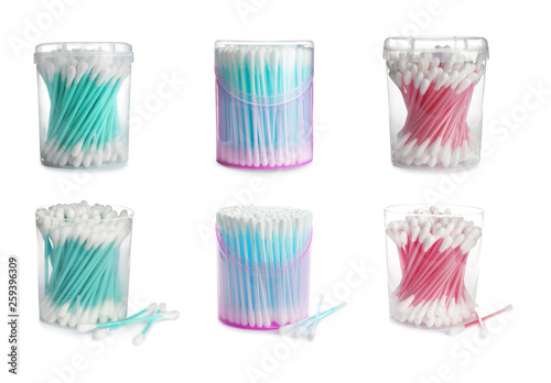 Set of boxes with clean cotton swabs on white background