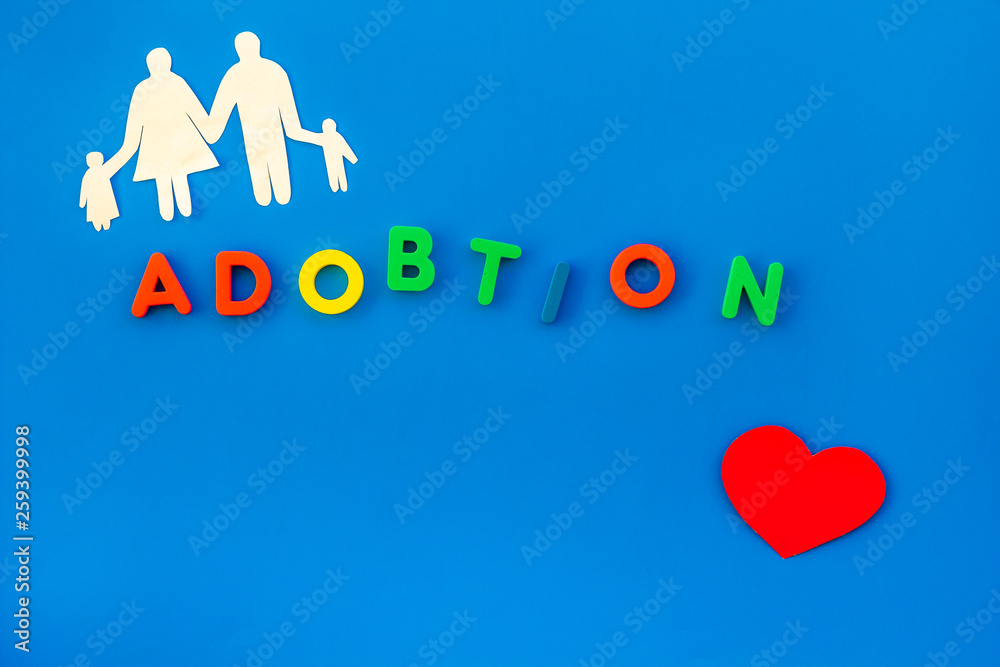 Family concept and adoption child copy on blue background top view