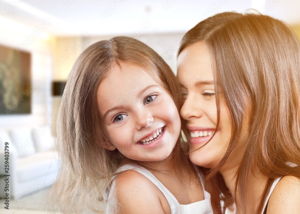 Happy Mother and daughter hugging Happy Mother and daughter hugging