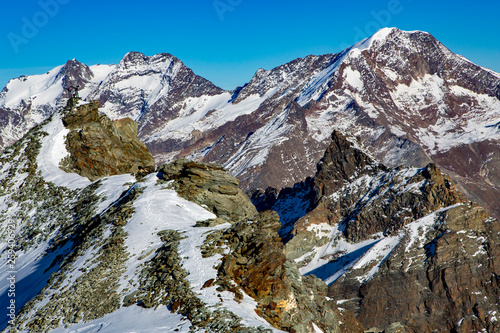 Swiss Alps: mountain of Taschhorn at height of 4491 meters, fantastic vistas of the Mischabel chains four-thousand metre peaks is the uncrowned queen of the Mischabel group. Switzerland. photo