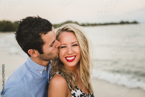 Husband and Wife Kissing on Vacation