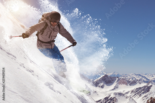 Man skiing on snowcapped mountain