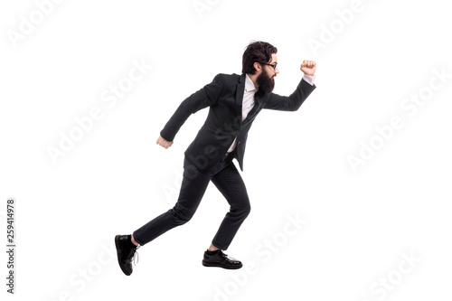 Full length portrait of a running bearded businessman in glasses, isolated on white background