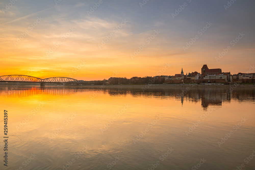 Fototapeta premium Amazing sunset over Vistula river in Torun, Poland