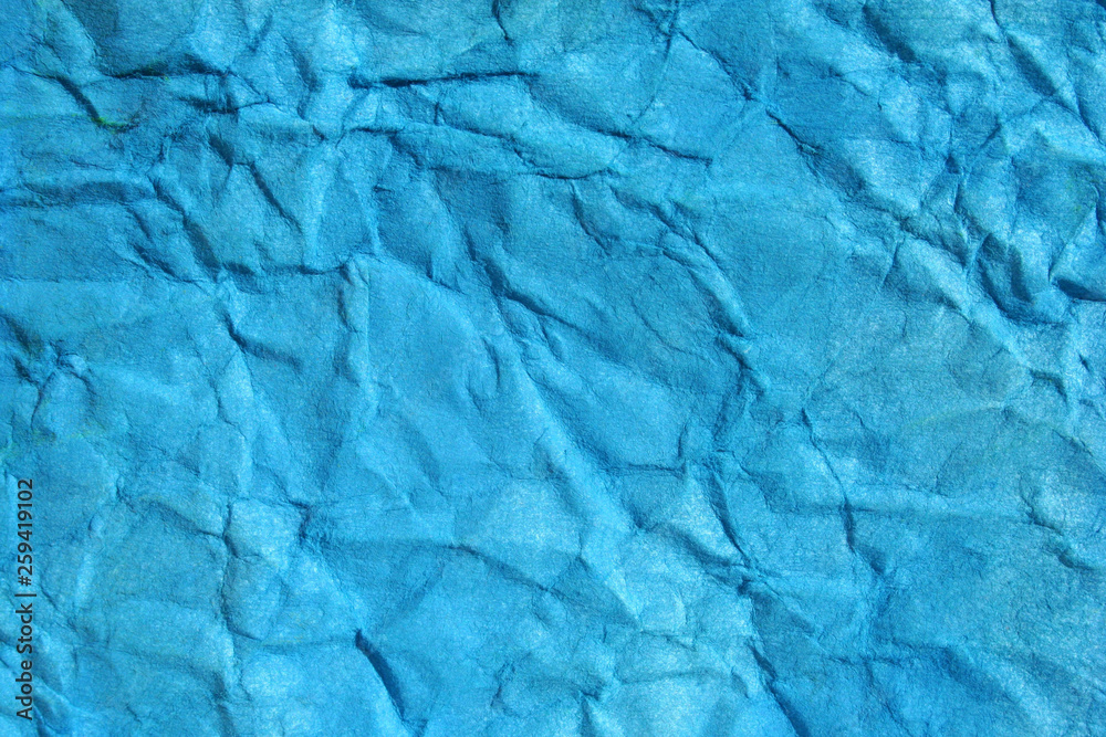 blue color crinkled paper as background blue color crinkled paper as background