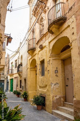Beautiful typical narrow street in Rabat, Malta, streetscape detail