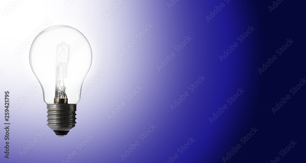 ampoule à filament illuminée sur fond bleu dégrdé ampoule à filament illuminée sur fond bleu dégrdé