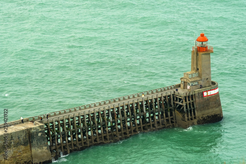 Pier and lighthouse in Fecamp harbor. Normandy France photo