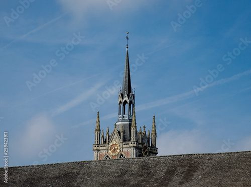 The tip of the Saint Nicholas Church's tower, in Enghien, Belgium photo