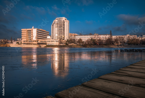 Office Buildings with Reflections in Semi Forzen Strkovec Lake in Bratislava, Slovakia