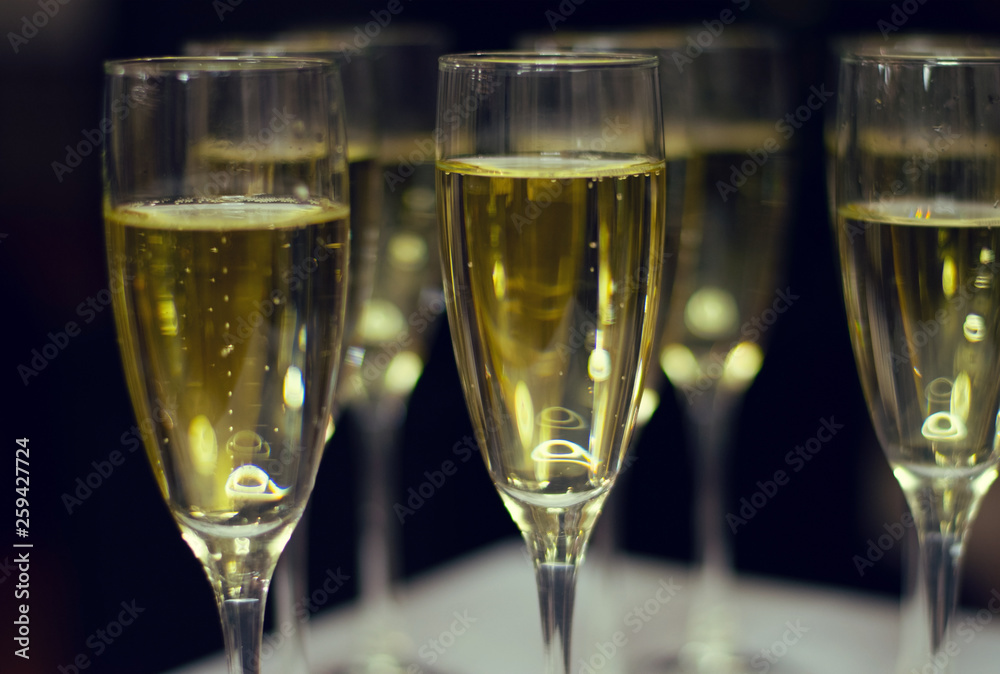 Glasses of champagne on a table. Glasses of champagne on a table.