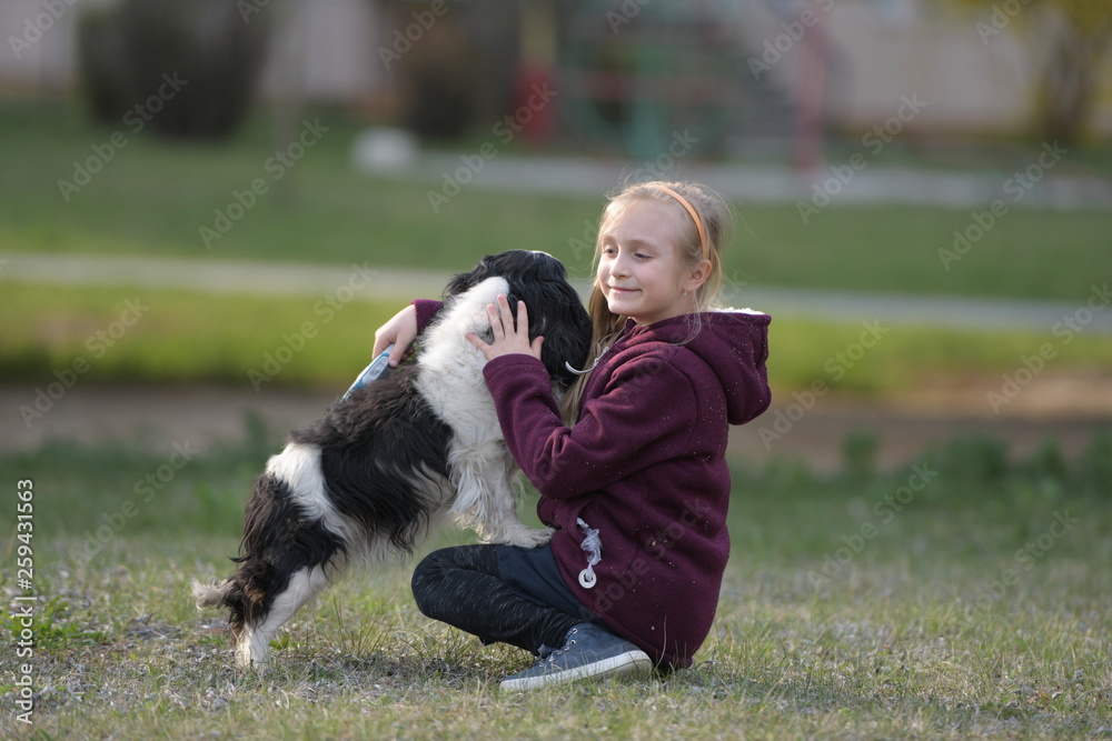 happy child girl with her dog happy child girl with her dog