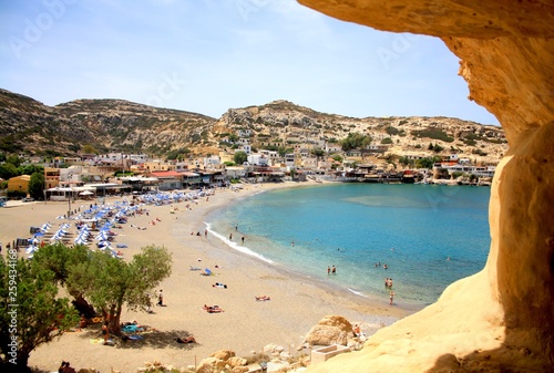 View from a cliff to Greek Matala Beach. Summer hollidays and vacation in Greece, Crete.