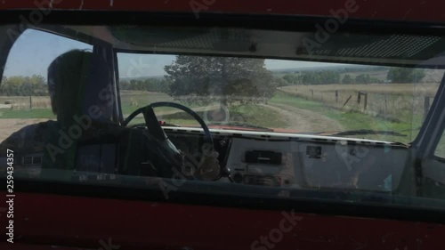 Farmer Driving Old Pickup Truck