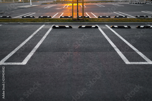 Empty parking lots during Golden Hour sunset at a popular typical Shopping centre photo