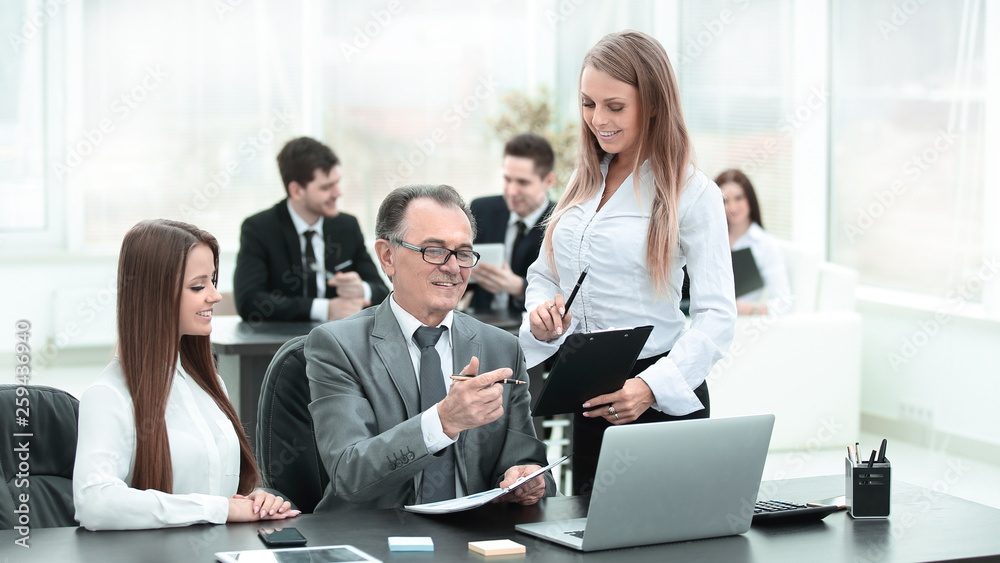 business team discussing with the head of financial data