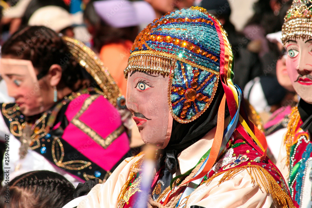 Paucartambo, Cusco, Peru - Circa July 2013: Man wearing a typical mask at Paucartambo's religious festival of Virgen del Carmen. Colorful traditional 