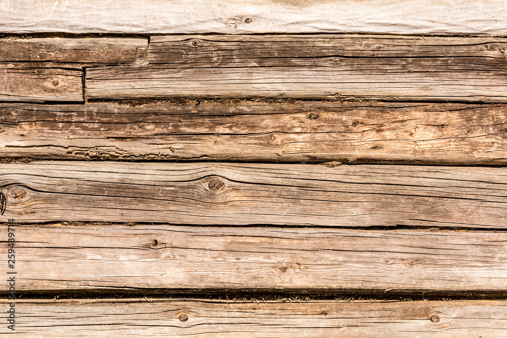 old log wall, texture of antique wooden logs, close up decor abstraction background old log wall, texture of antique wooden logs, close up decor abstraction background