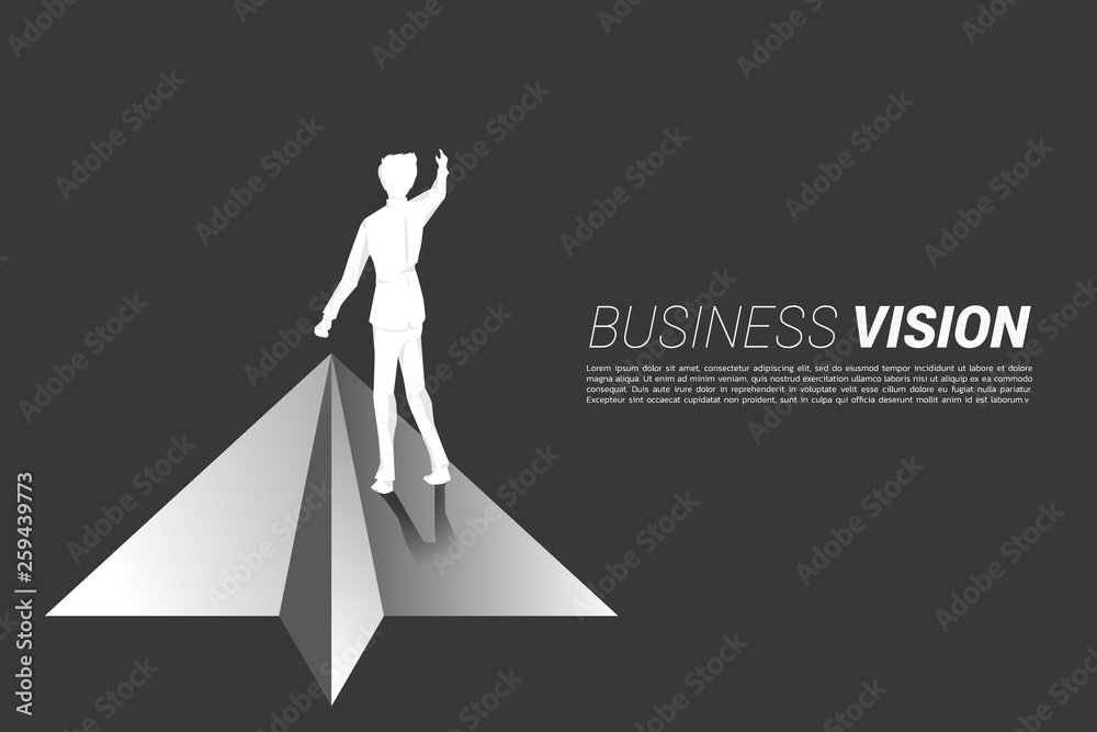 silhouette of businessman standing on origami paper airplane. Business Concept of leadership, start business and entrepreneur silhouette of businessman standing on origami paper airplane. Business Concept of leadership, start business and entrepreneur