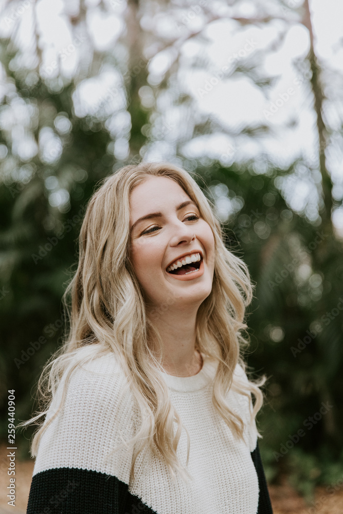 Beautiful Attractive Blond Hair Young Fair Skinned Caucasian Woman with Pretty Smile in Nature for Headshot Portraits Outside