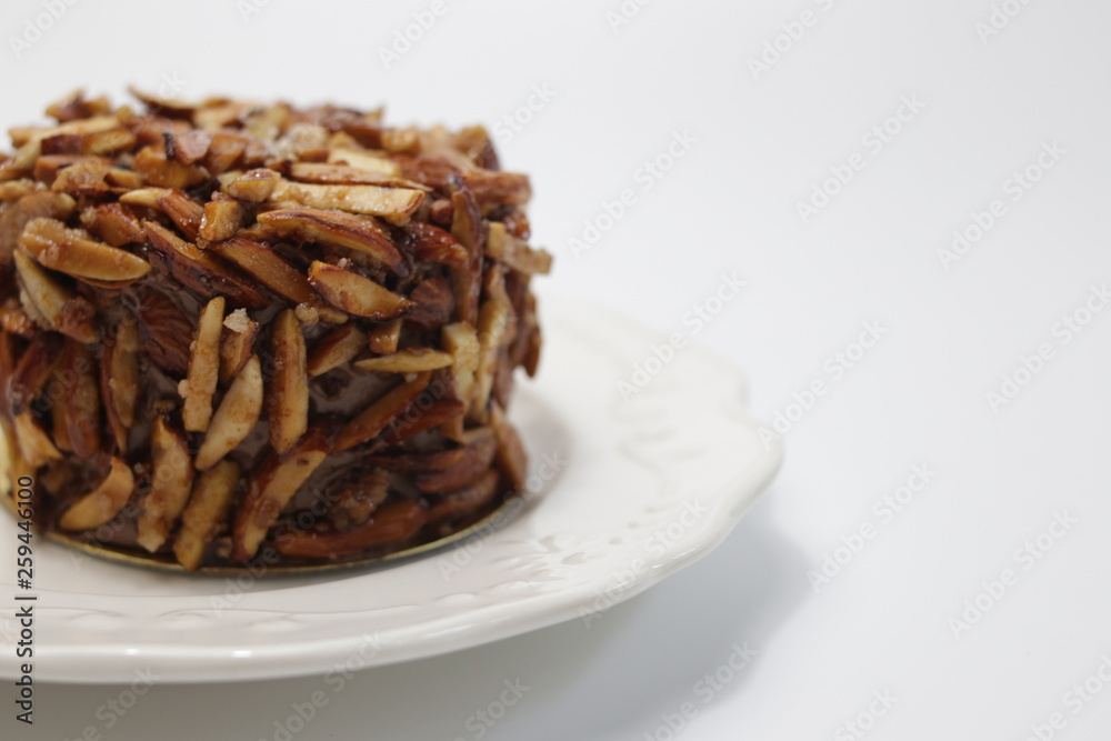 Almond Chocolate Cake on White Background Almond Chocolate Cake on White Background
