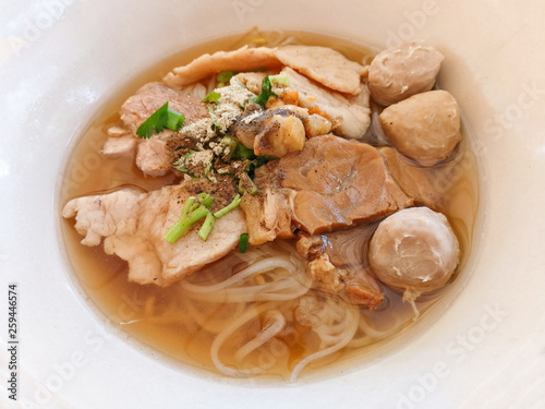 Noodles soup bowl with pork meat ball and vegetables traditional thai and chinese style food of asian