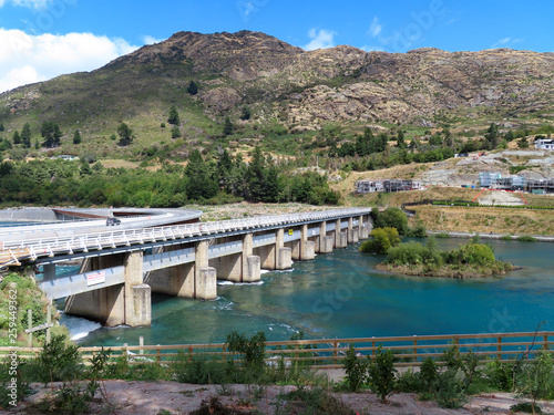 Old and new bridges and obsolete dam over Lake Wakapitu, Queenstown, New Zealand