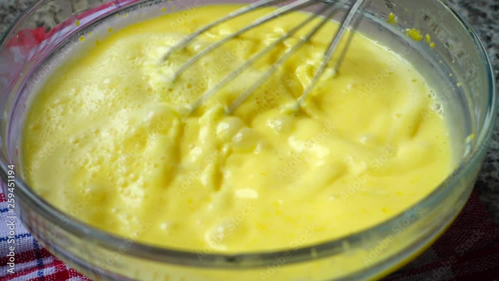 Preparation of omelet from eggs and milk. Slow motion. Preparation of omelet from eggs and milk. Slow motion.