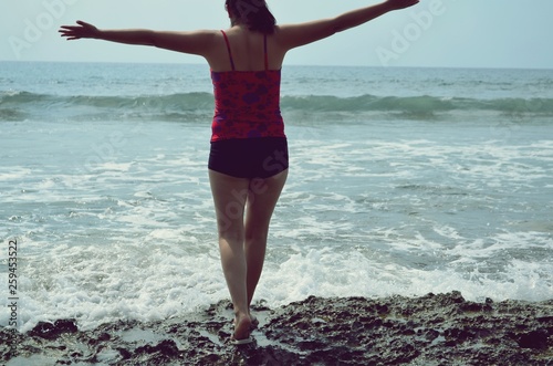 Beautiful girl on the beach of San Juan, Philippines photo