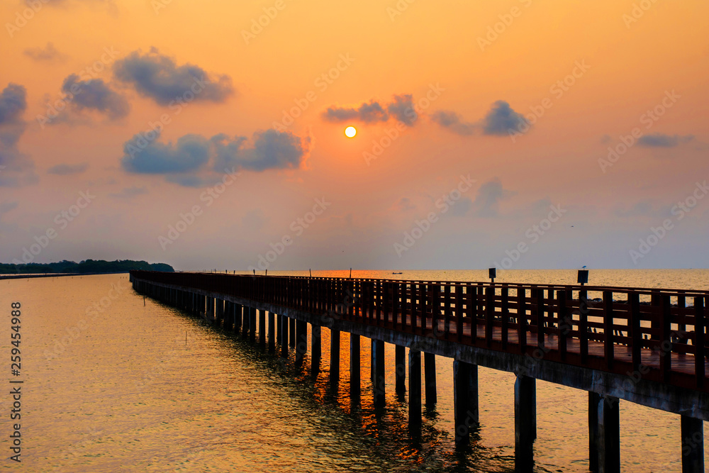 Obraz premium Long Bridge at sea view on morning seascape sunrise background