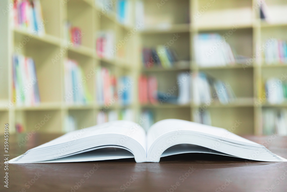 book opened on the table bookshelf background book opened on the table bookshelf background