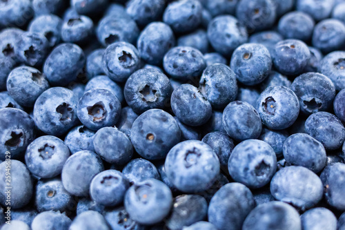 Close up fresh blueberries grouped macro background